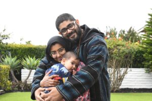 Happy young millennial ethnic modern Pakistani Muslim family