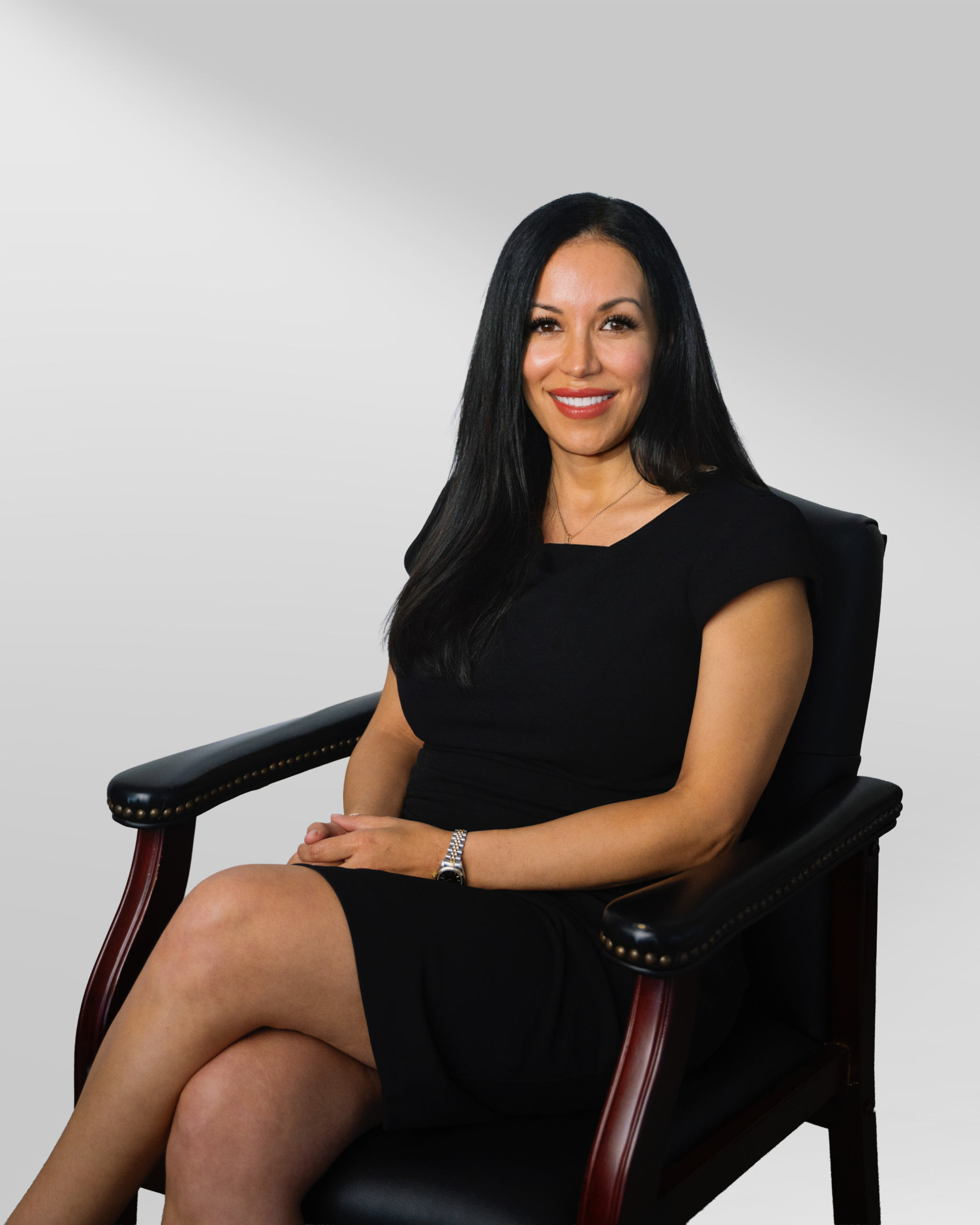 Gilda McDowell seated in a professional office setting