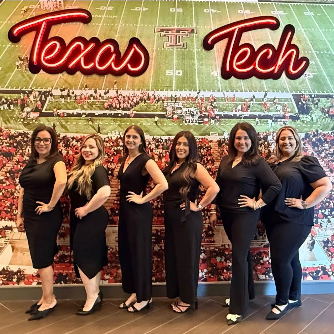 The Law Office of Gilda McDowell team at a Texas Tech event in Lubbock